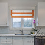 Custom Chevalle Range Red Border Relaxed Roman Shade