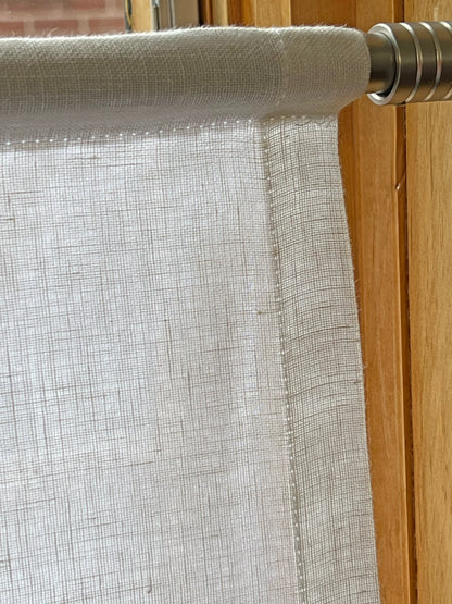 Close-up of the structured rod pocket on a flat-style Utopia Natural cafe curtain, sewn straight and even to the rod diameter