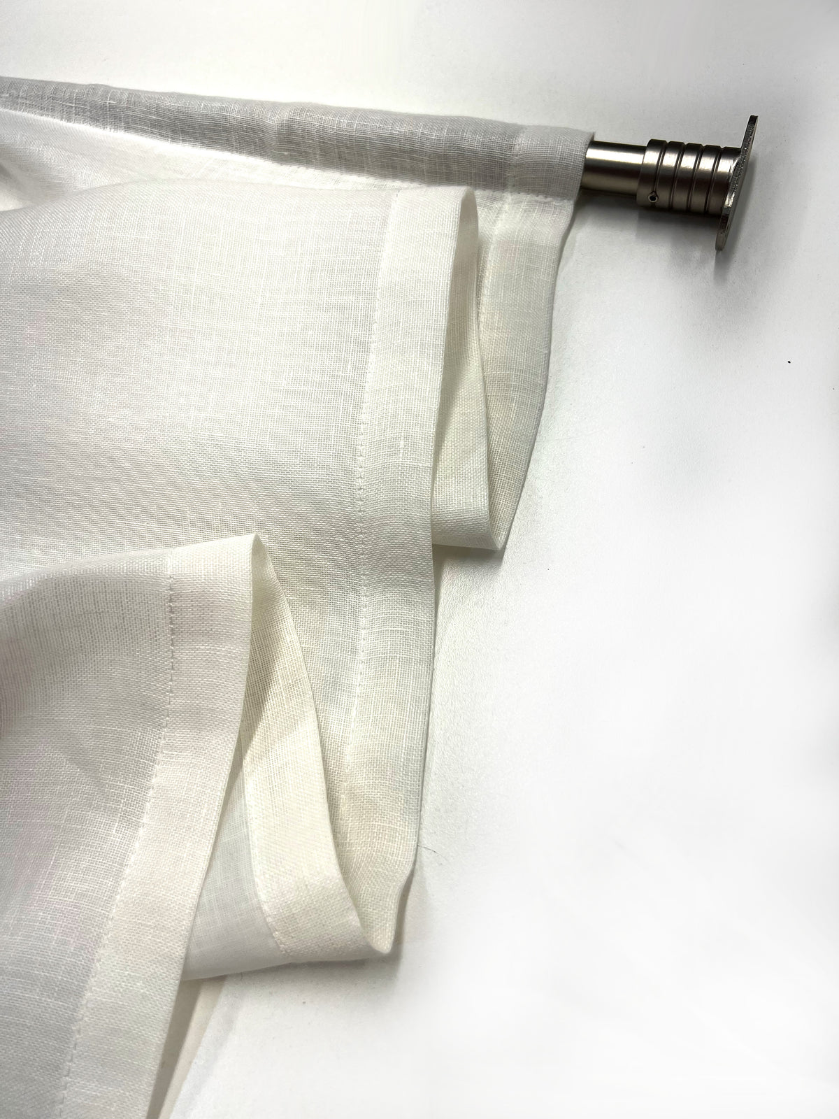 Utopia Natural cafe curtain with sheer lining softening the daylight on the window