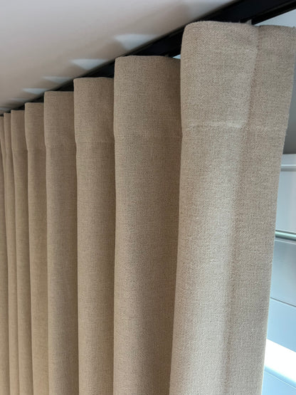 Far drapery panel hanging in soft ripple folds, made to order in Toronto