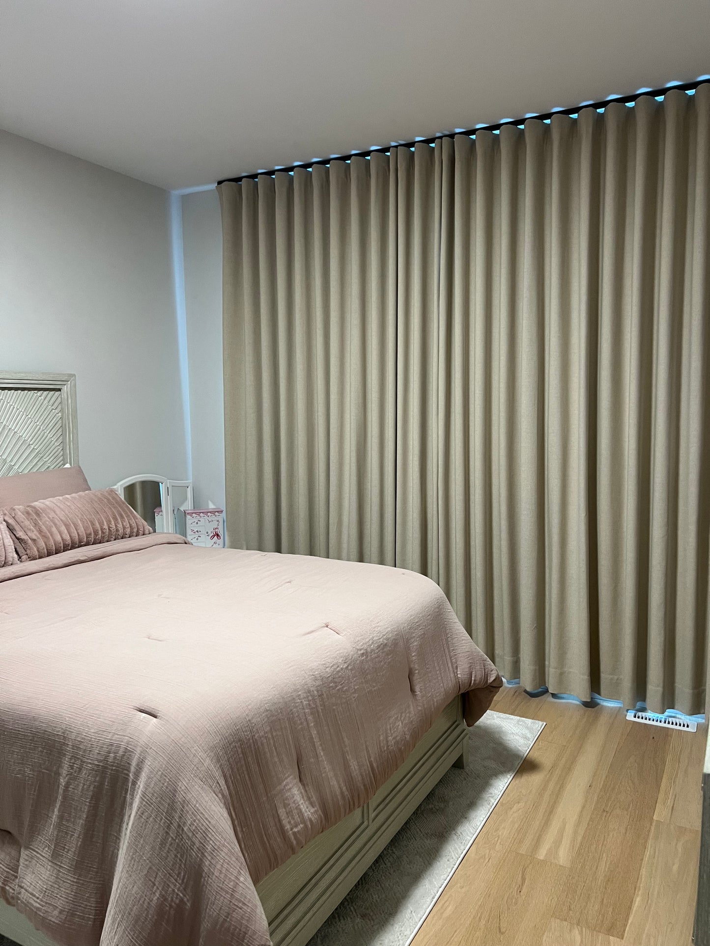 Far ripple fold drapery panel, finished made-to-order panel on a track
