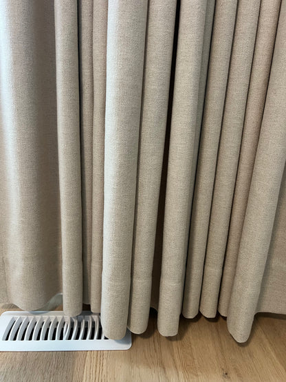 Far drapery panel in ripple fold style, lined custom panel shown in place