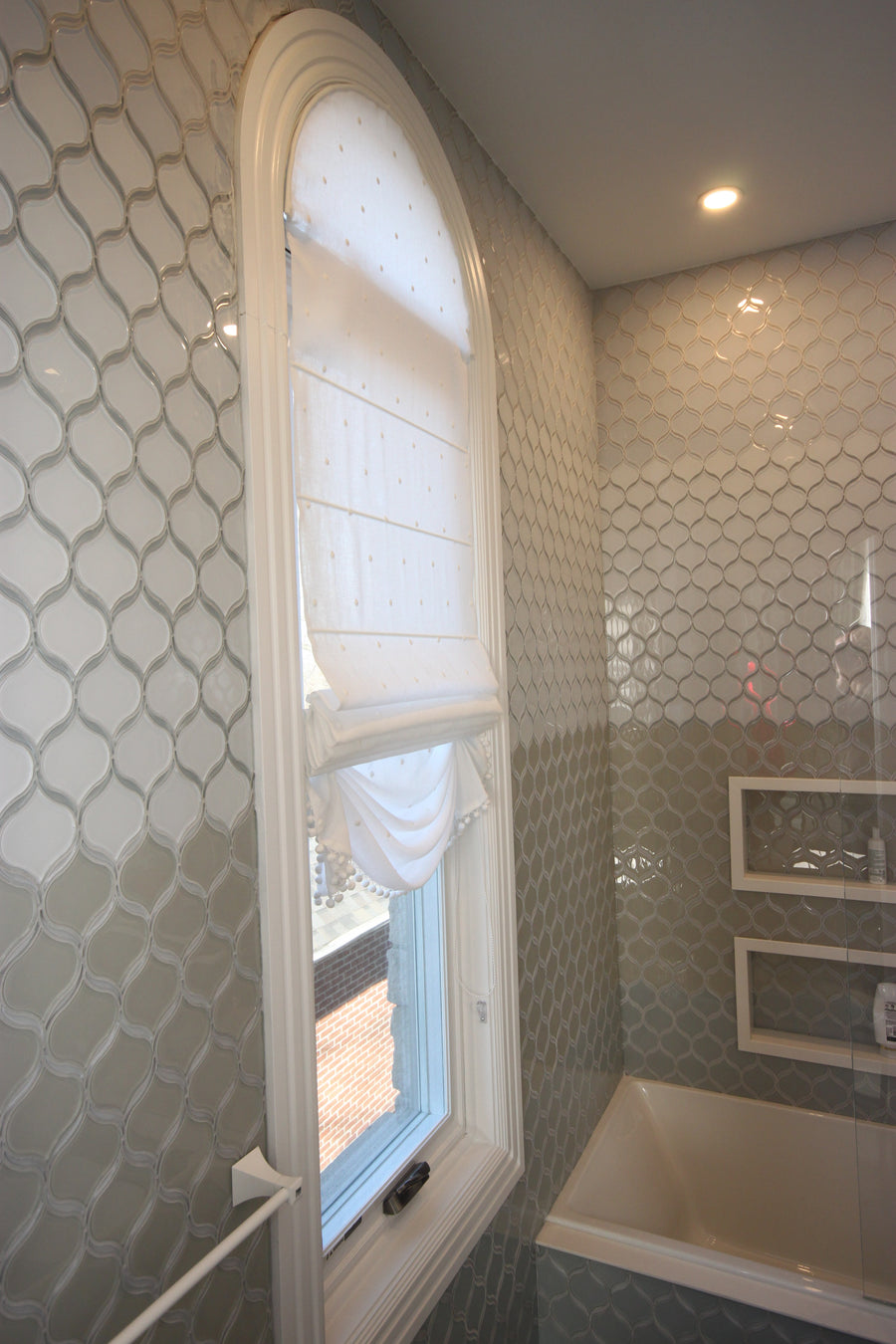 Bathroom with a linen Roman shade