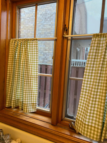 Café curtain on a French door hung on two rods, top and bottom