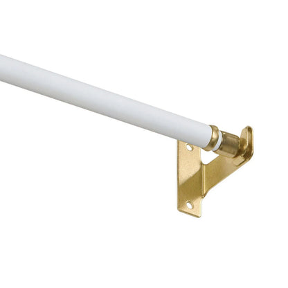 White café rod holding a linen café curtain across a small kitchen window