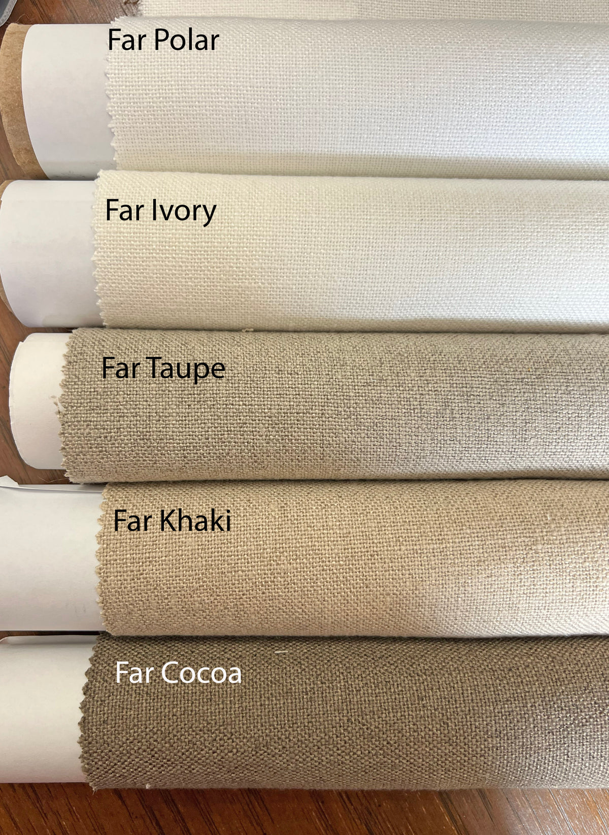 Far faux linen palette on the roll — Polar, Ivory, Taupe, Khaki and Cocoa, five neutral Roman shade colours