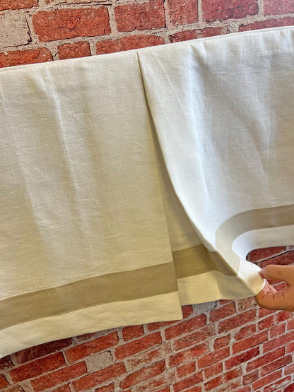 White faux-linen curtain panel with beige border