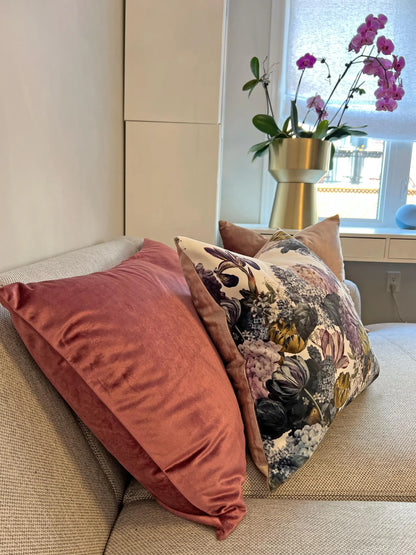 Velvet flowers cushion in a bedroom setting