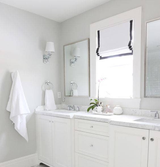 White faux linen relaxed Roman shade with black border, custom made