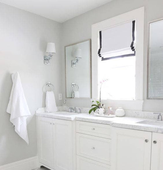 White faux linen relaxed Roman shade with black border, custom made