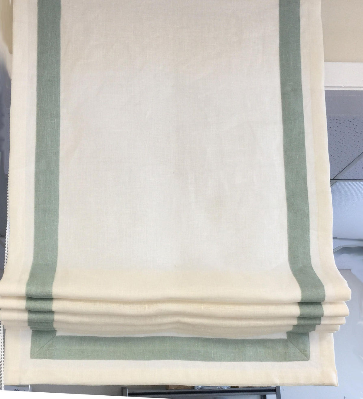 Cordoba linen relaxed Roman shade with Rendezvous contrast border