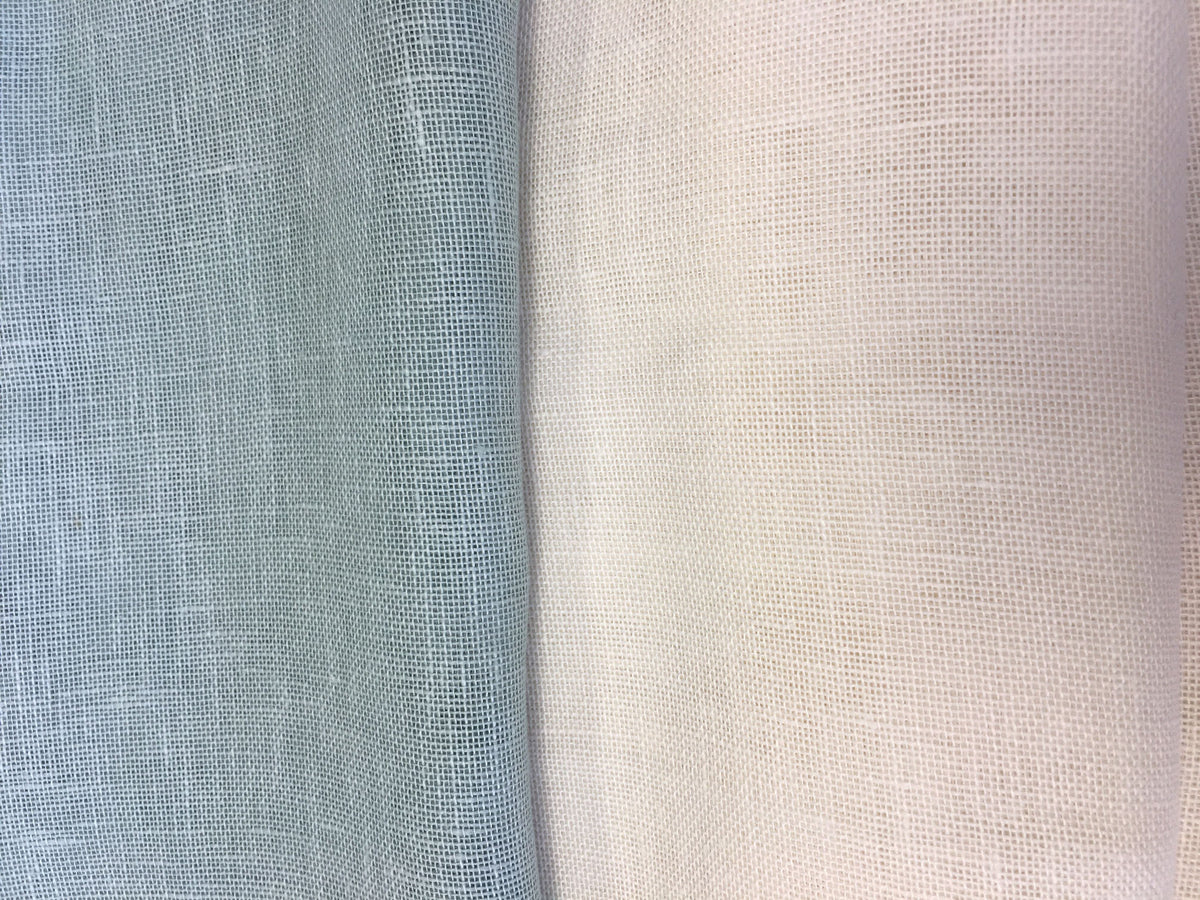 Cordoba linen relaxed Roman shade with Rendezvous contrast border