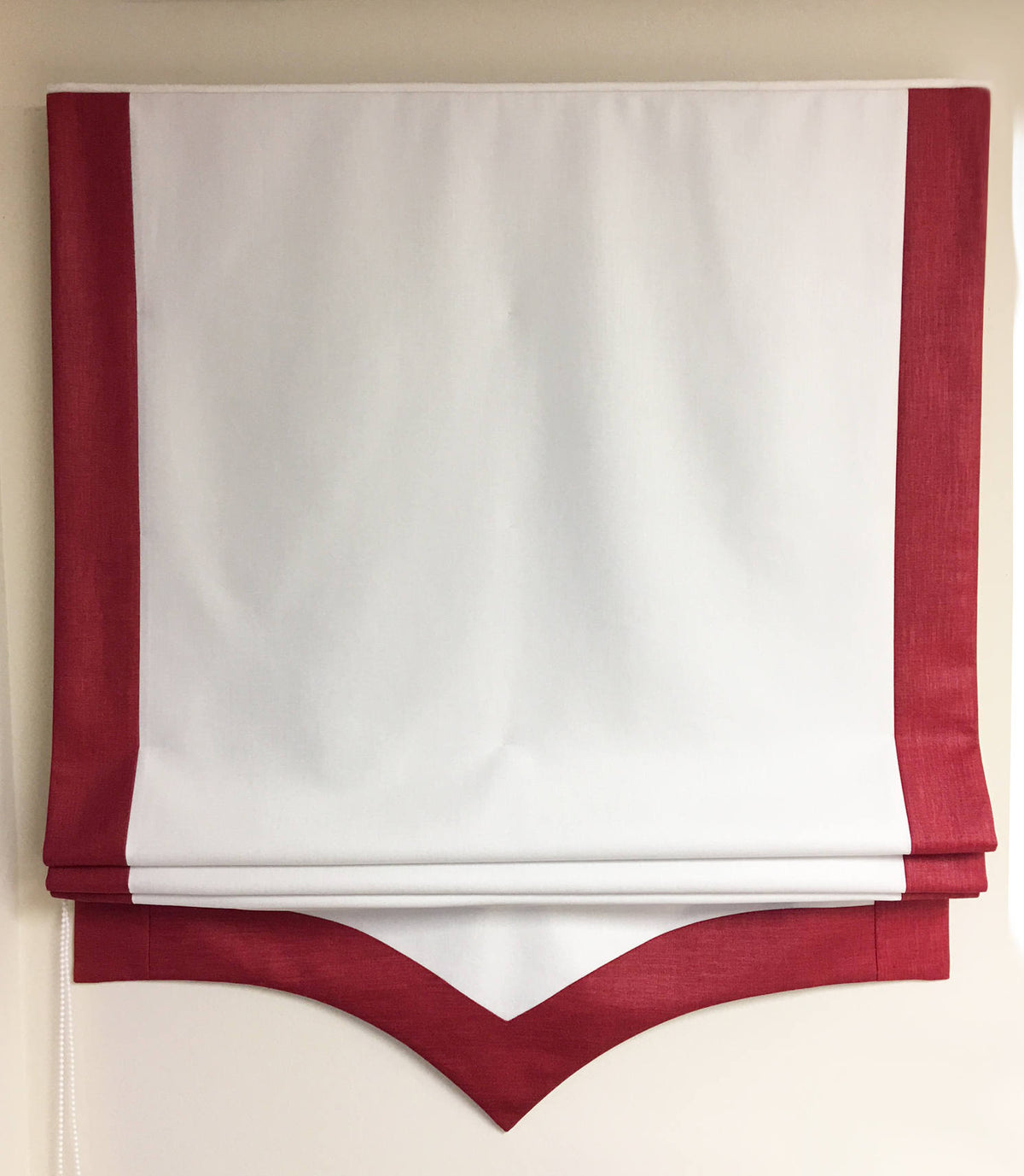 Scalloped border detail showing the mirrored curve along the lower edge