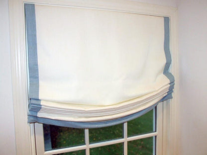 Relaxed Roman shade detail, blue linen border