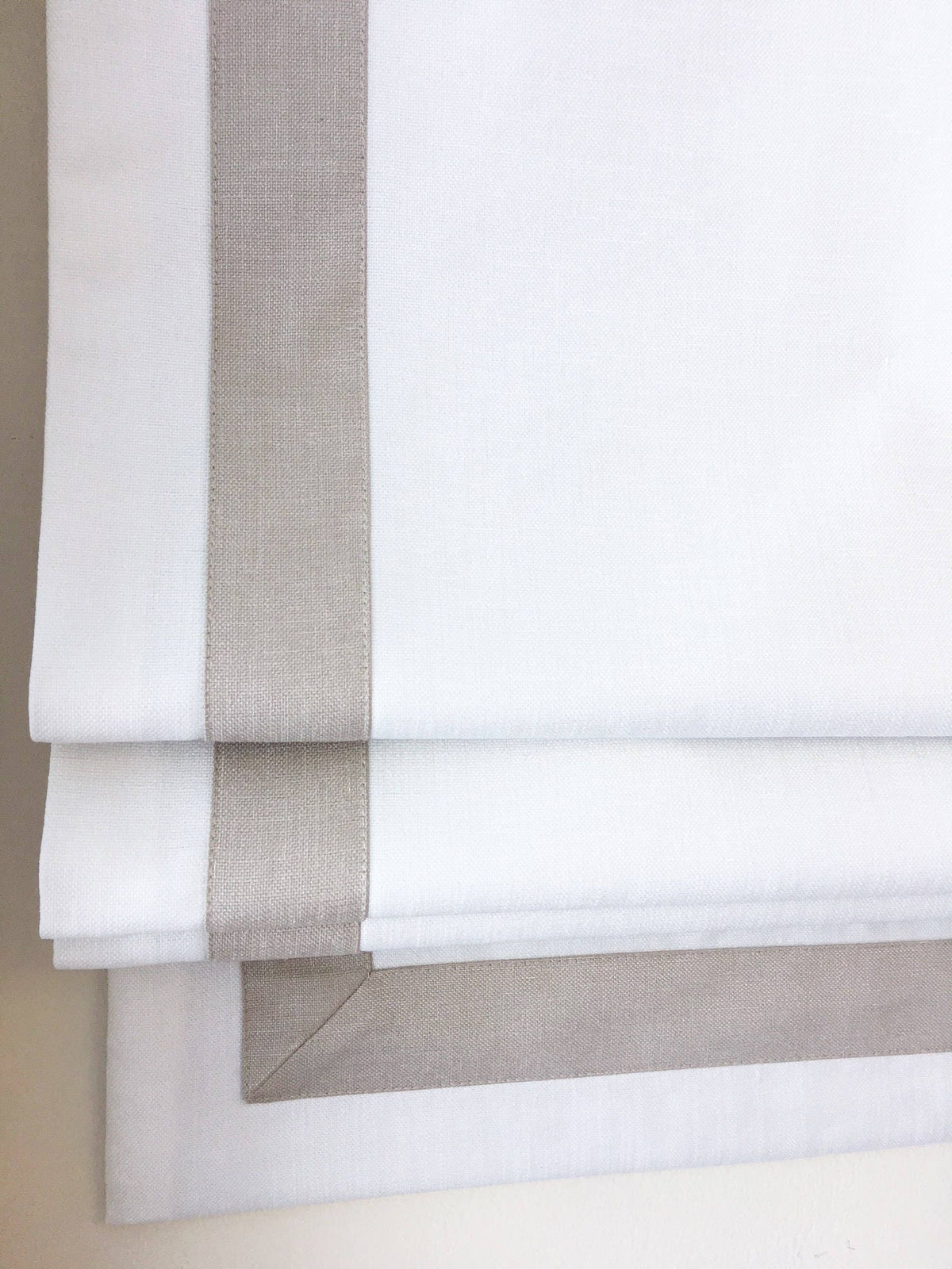 Cheval faux linen relaxed Roman shade with contrast linen border — custom size