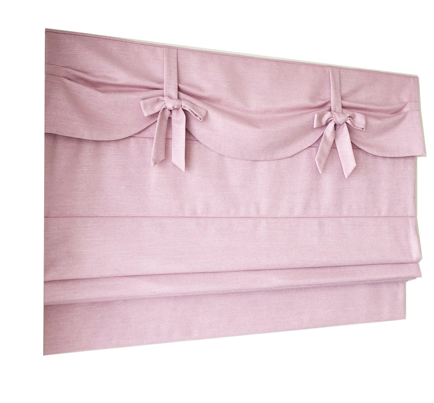 Dolce Blush flat Roman shade in a nursery window, handmade in Toronto