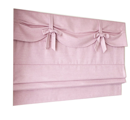 Dolce Blush flat Roman shade in a nursery window, handmade in Toronto