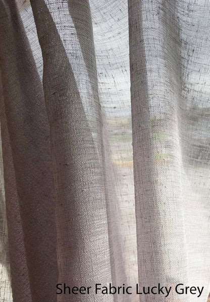 Close-up of Lucky sheer fabric in Grey showing the woven texture