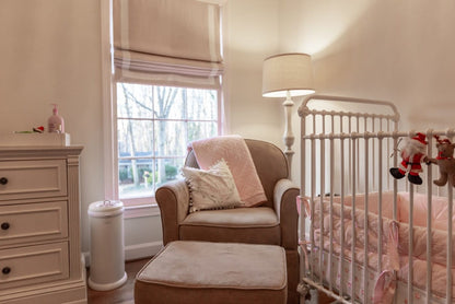 Tuscany linen relaxed Roman shade with white border, raised in a bright window