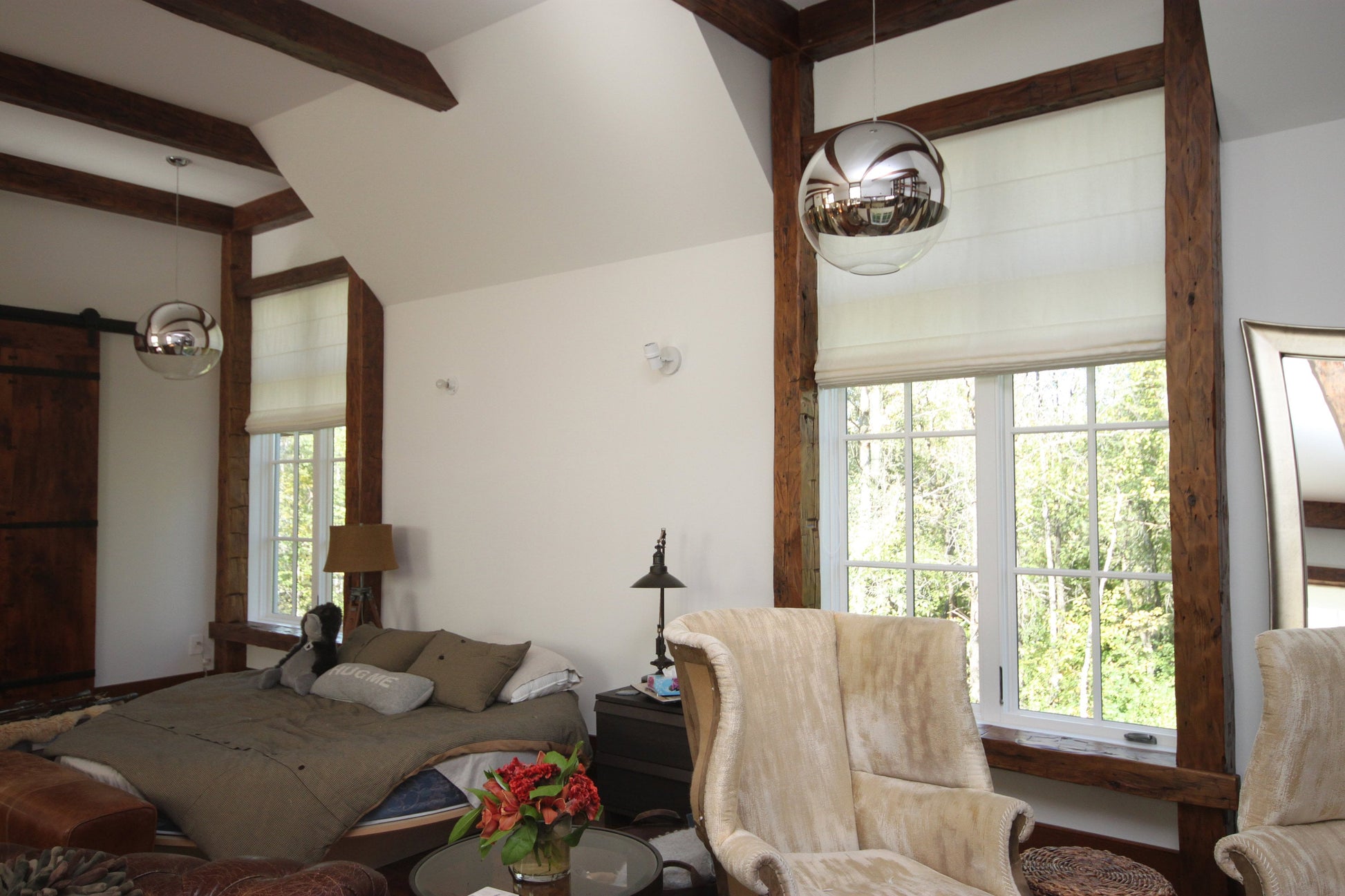 Bedroom with two windows dressed in ivory flat Roman shades — LOGANOVA