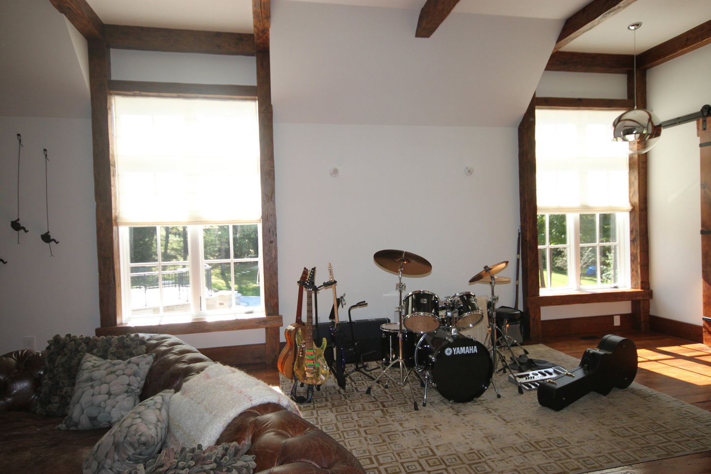 Music room with tall windows in light-filtering linen Roman shades — LOGANOVA