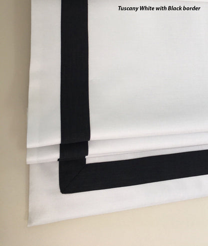 Bottom edge of the shade with weighted bar and white border