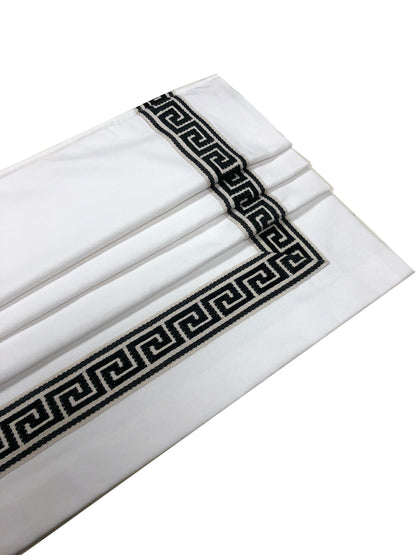 White faux Roman shade valance with black Greek key trim, folded profile — LOGANOVA