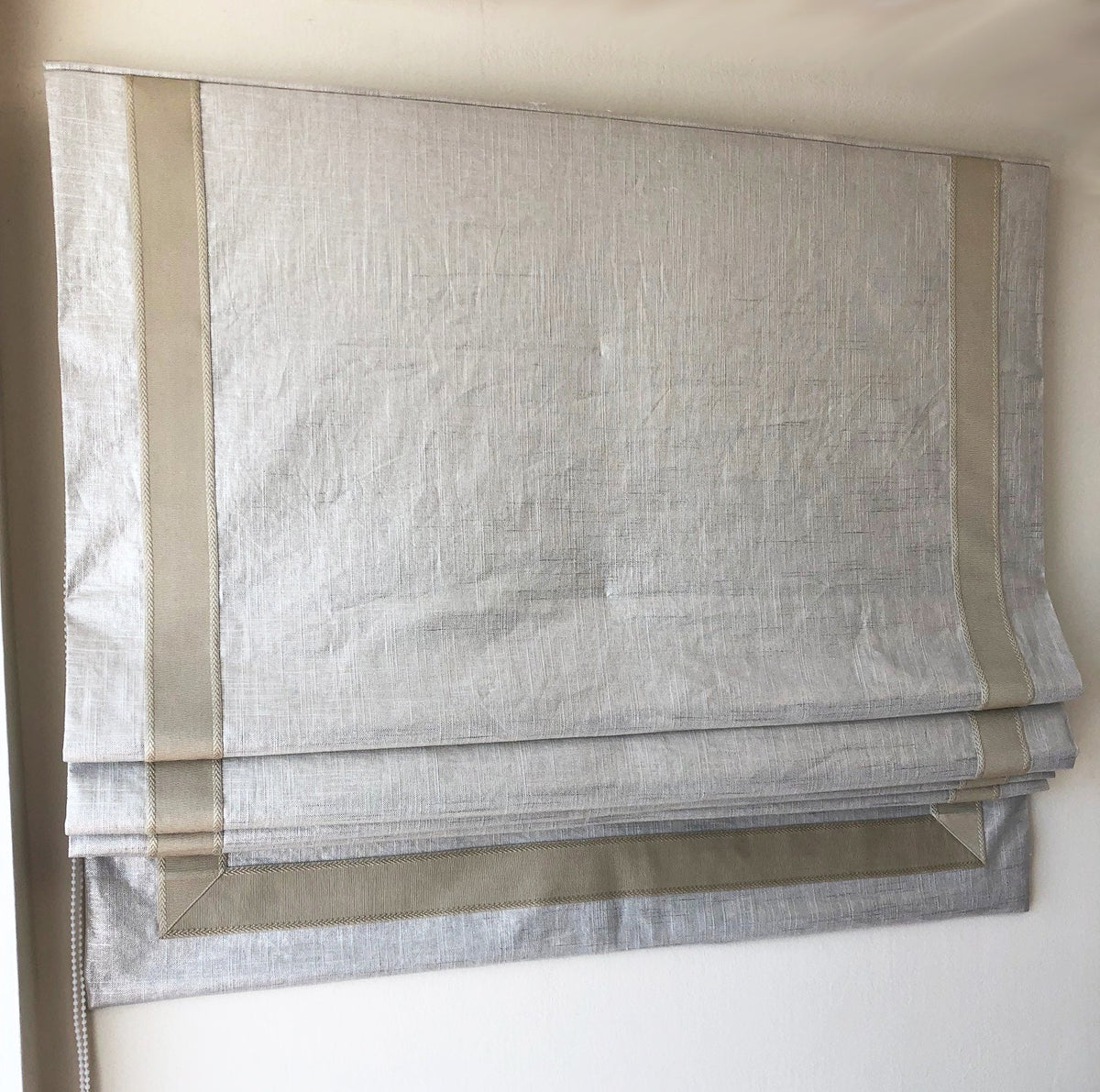 Shimmer linen blend relaxed Roman shade with geometric taupe border