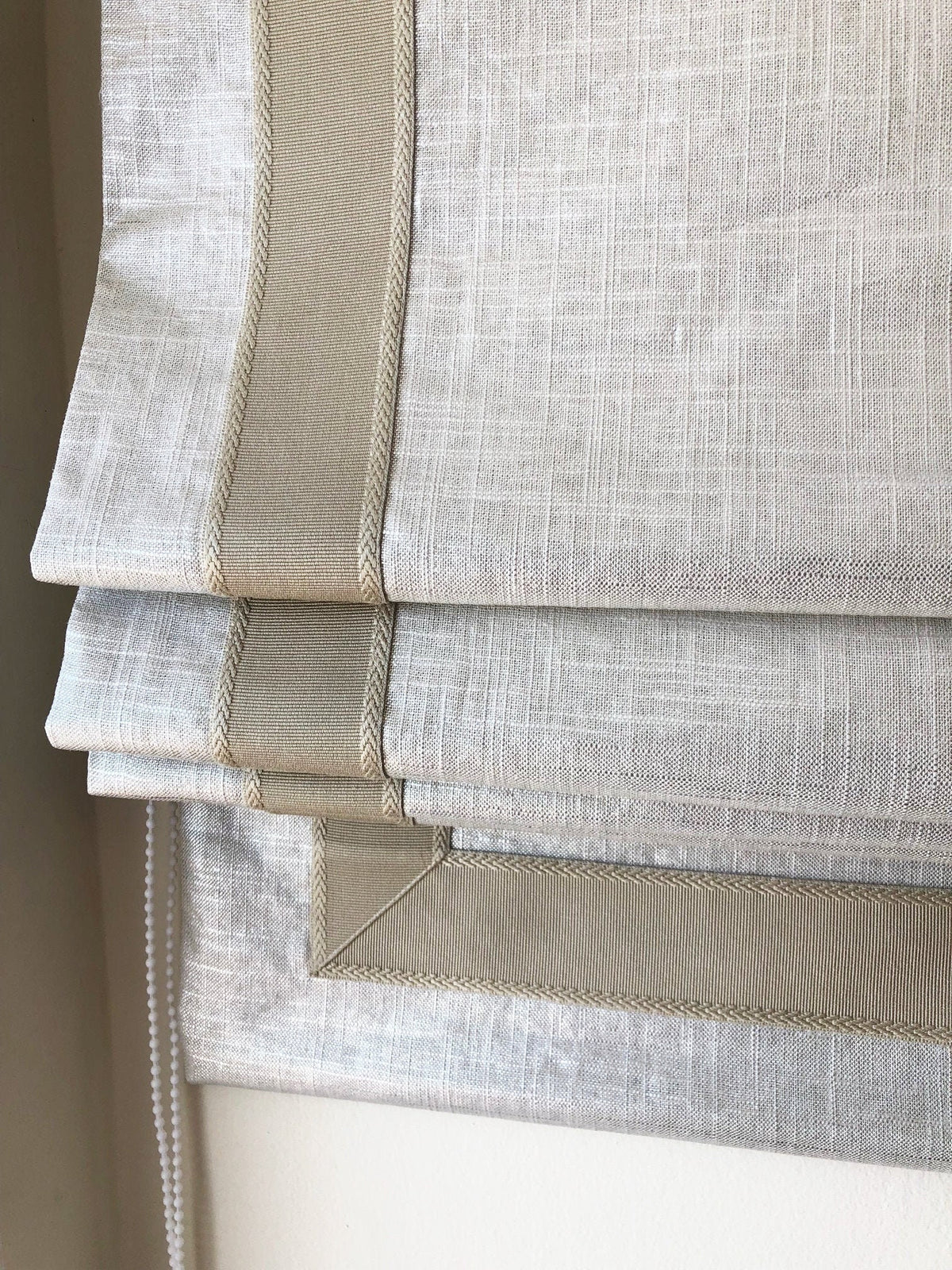 Shimmer linen blend relaxed Roman shade with geometric taupe border
