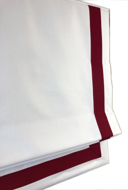 Relaxed Roman shade in Winter faux linen, soft curve of the relaxed fold