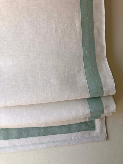 Cordoba linen relaxed Roman shade with Rendezvous contrast border