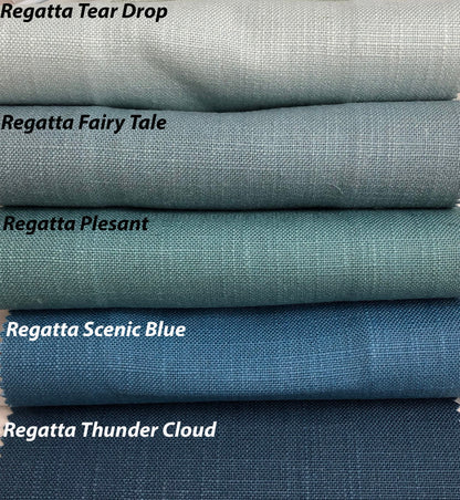 Regatta linen Roman shade shown raised into soft relaxed folds