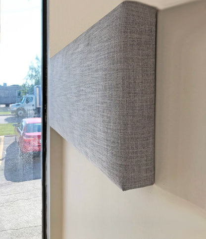 Three-quarter view of the cornice showing the padded return depth — LOGANOVA
