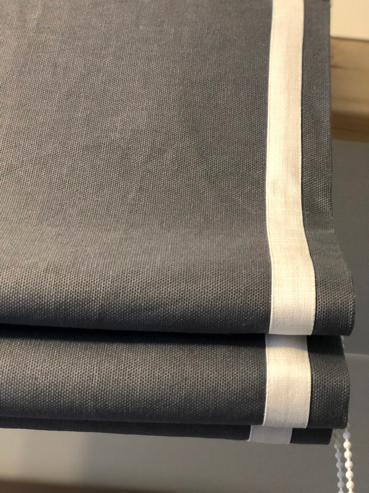 Irish linen relaxed Roman shade with 2-side inset border