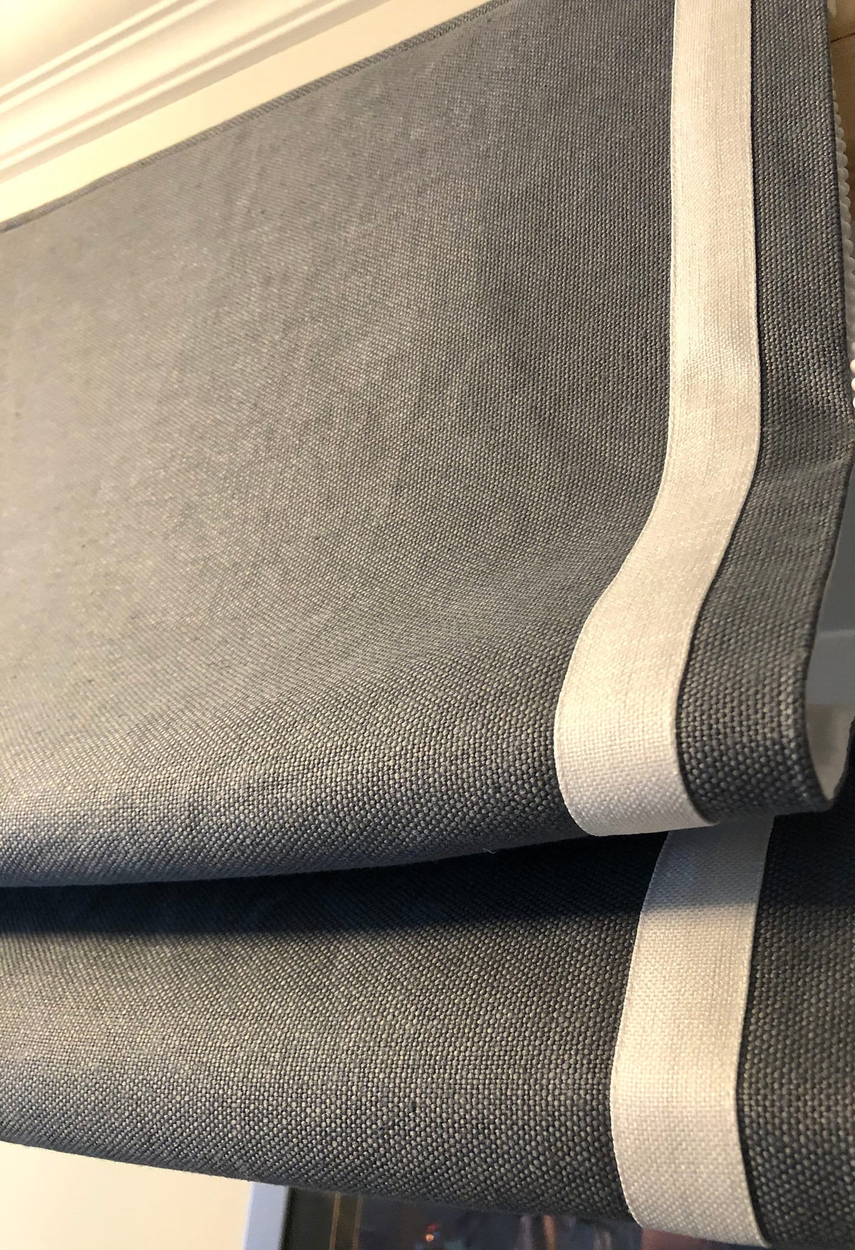 Irish linen relaxed Roman shade with 2-side inset border