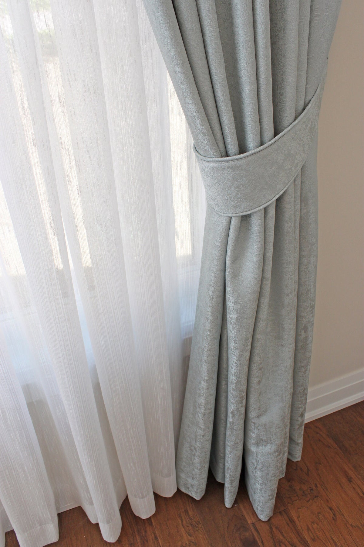 Lugano pleated sheer drapery in a living room setting