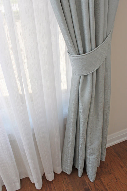 Lugano pleated sheer drapery in a living room setting