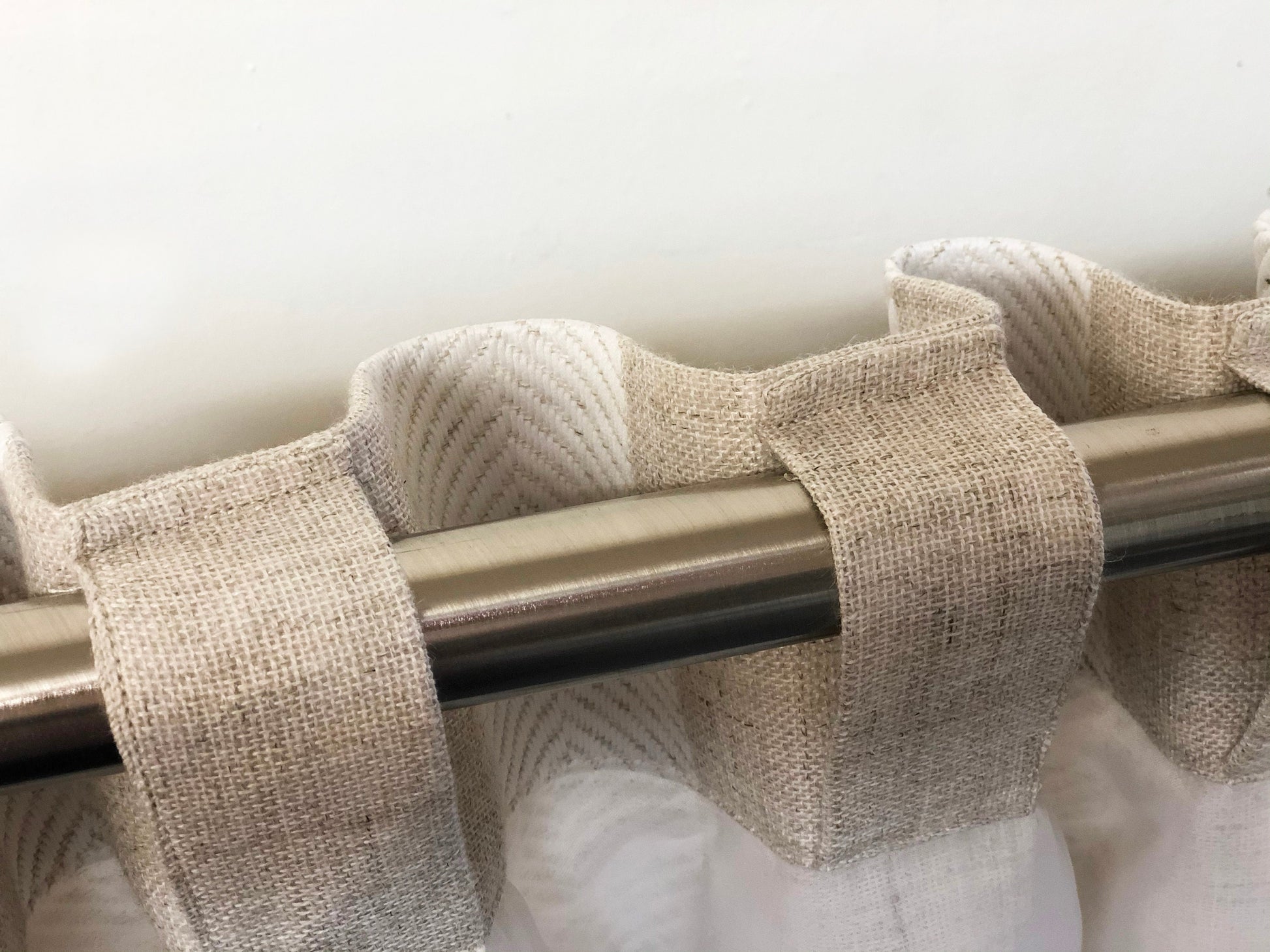 Hidden tabs riding the rod, close-up — LOGANOVA