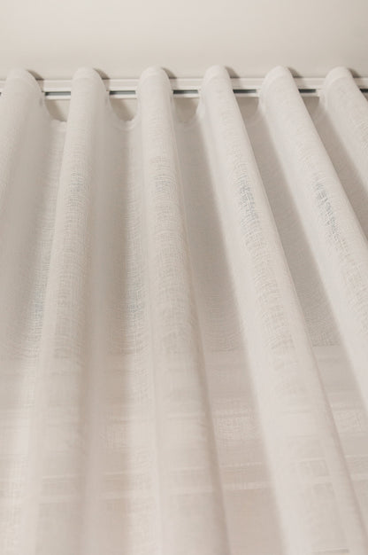 Berlin sheer S-fold header detail on white track — LOGANOVA