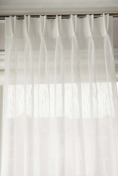Triple pleat heading detail with pre-installed drapery hooks