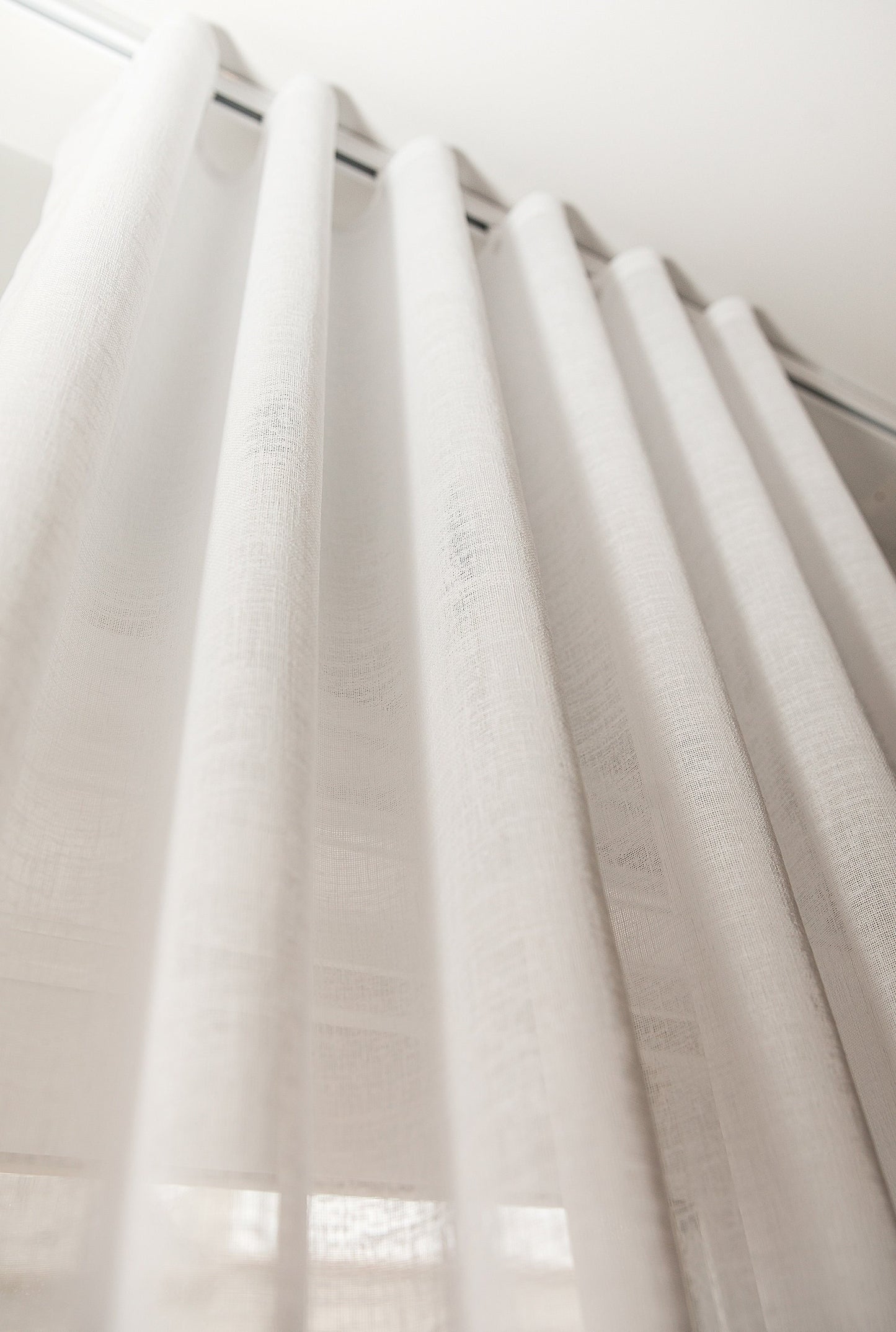 Berlin sheer ripple fold curtains on channel track, continuous S-wave — LOGANOVA
