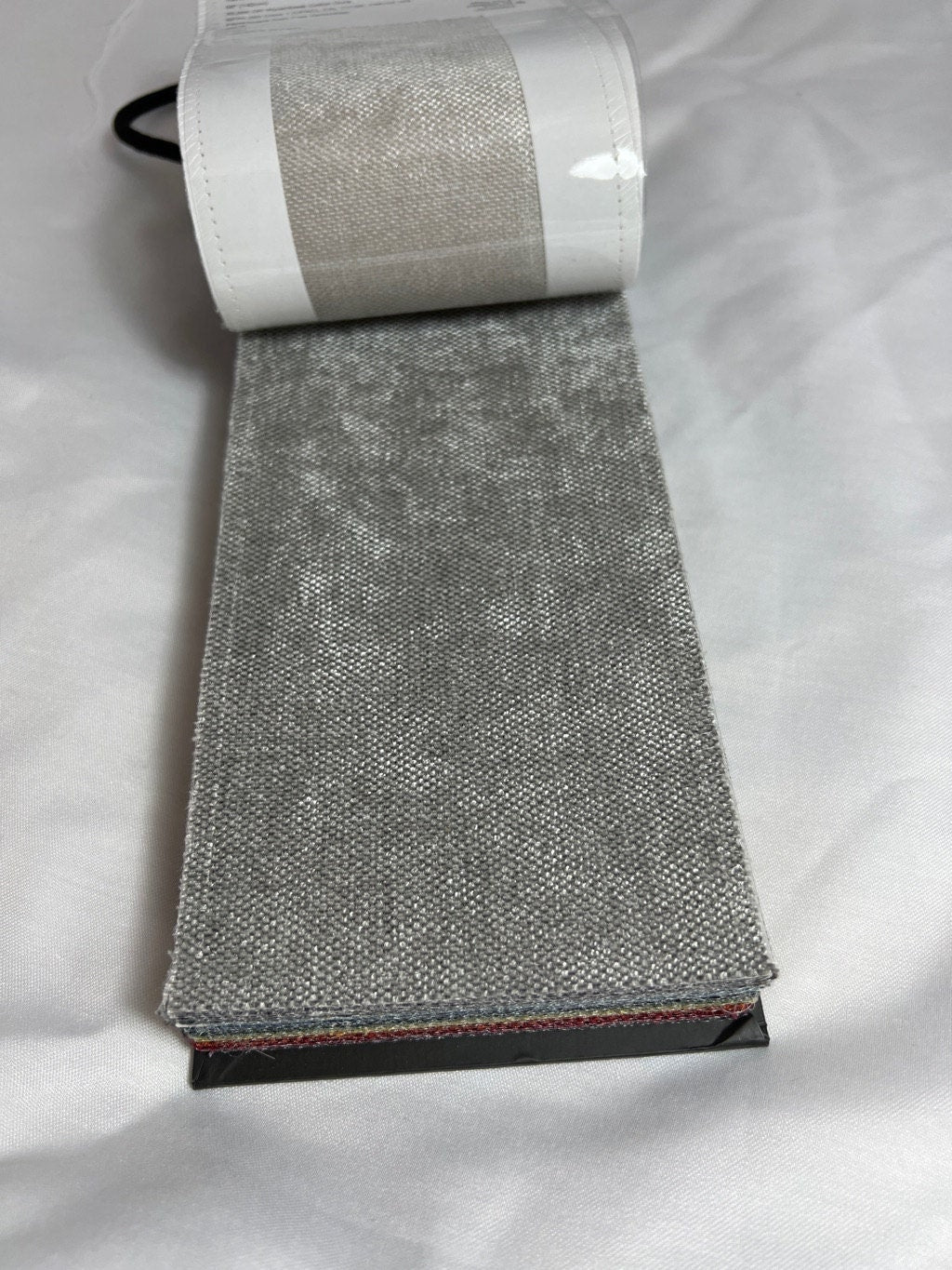 Mermaid swatch book fanned open, grey and neutral tones — LOGANOVA