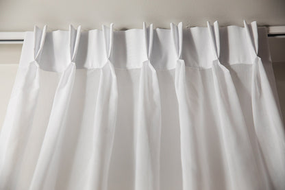 Close-up of the double pleat heading with pin hooks on a white track