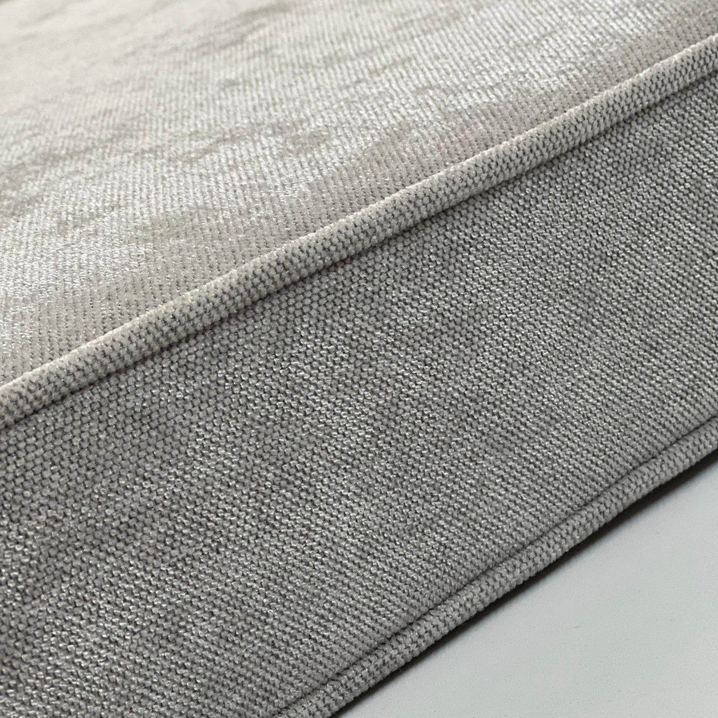 Piped edge of a made-to-order seat cushion, FibreGuard weave up close — LOGANOVA