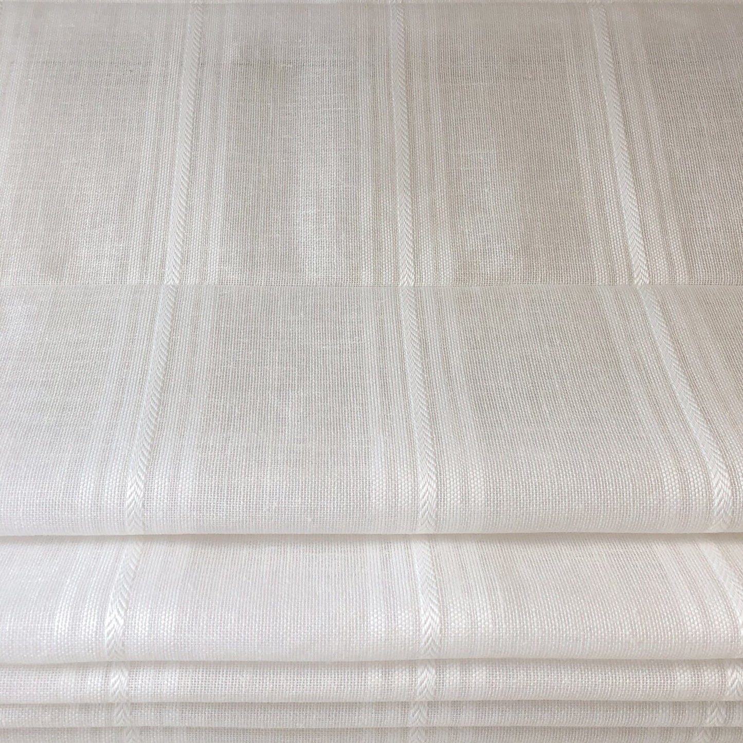 Allure linen flat Roman shade — fold detail, layered folds