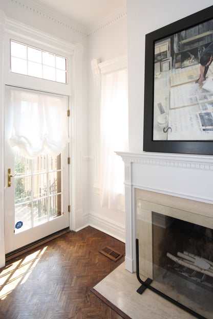 White London tulip Roman shade on a French door by the fireplace — LOGANOVA