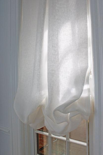 Daylight glowing through opaque Tuscany White linen, fold close-up — LOGANOVA