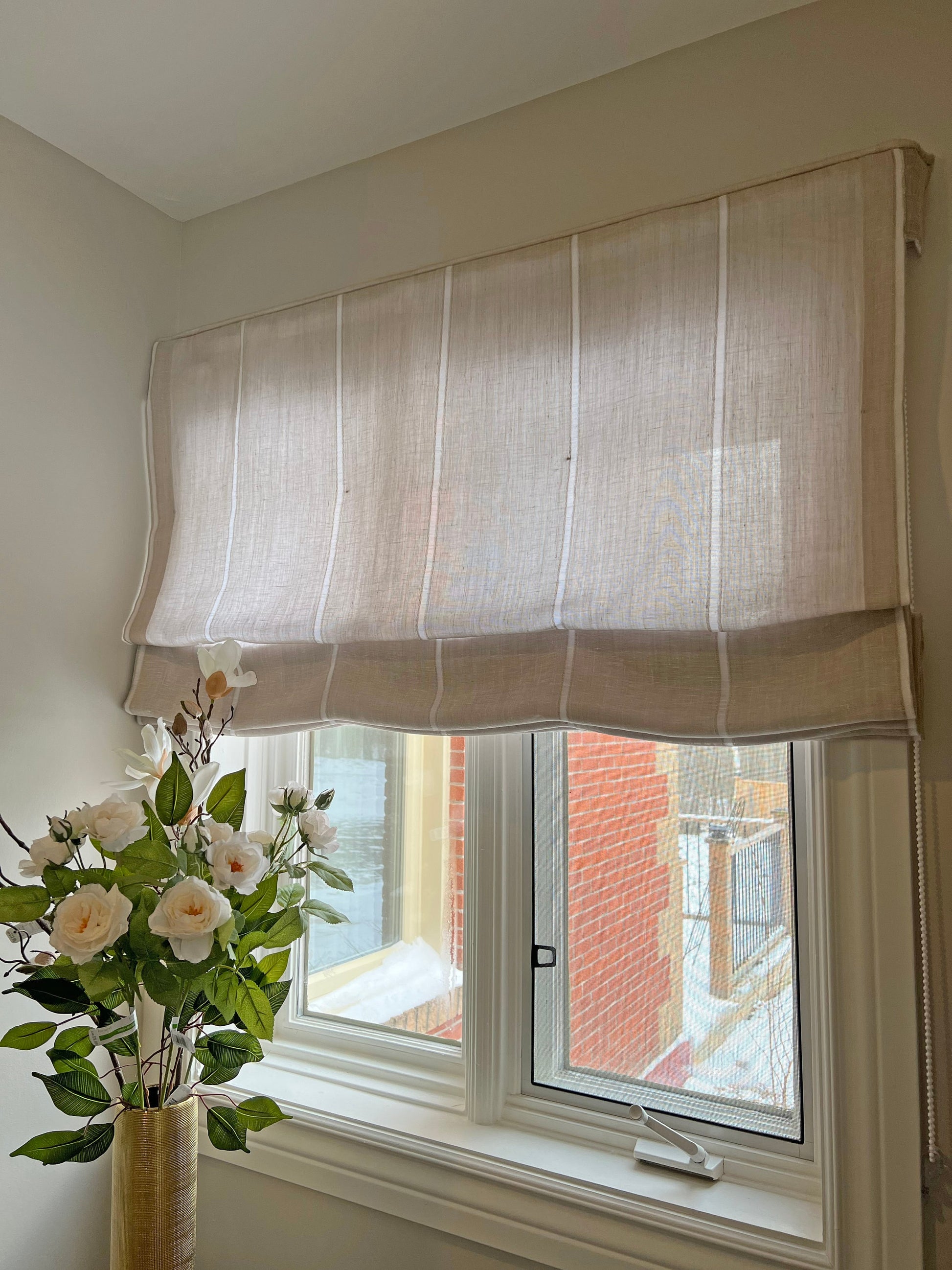 Sorrento Italian linen roman shade in a bright interior