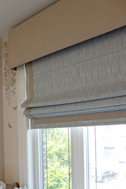 Cornice with contrast border over window