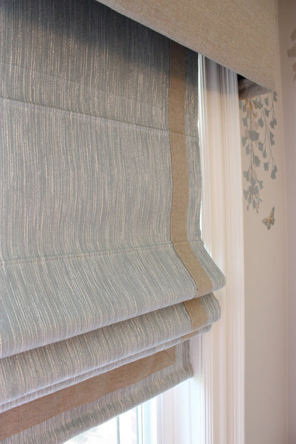 Cornice detail with curtain behind
